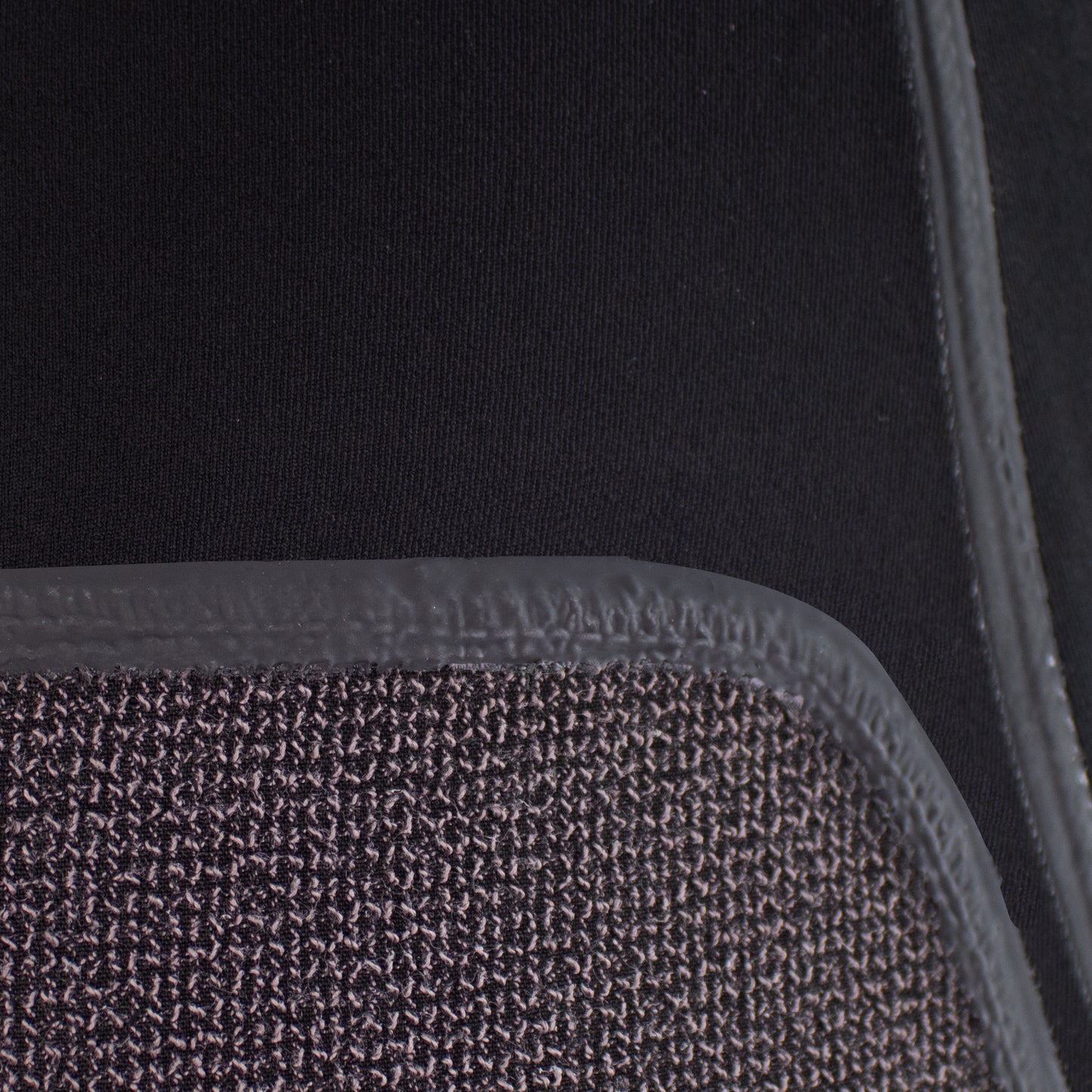 Close-up detail of a Kevlar fabric panel with liquid seal seam