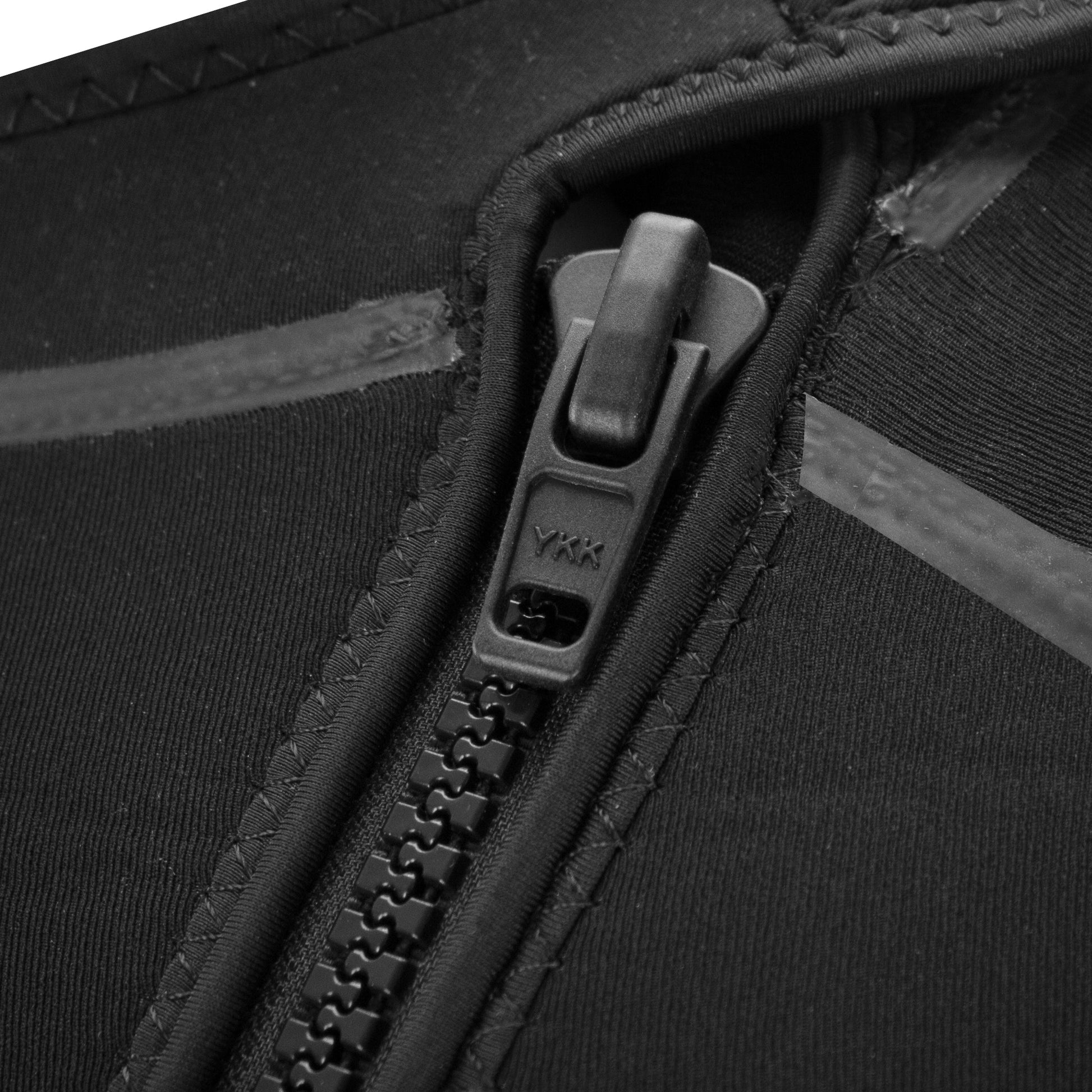 Close-up of a heavy duty YKK black zipper on a canyoneering wetsuit