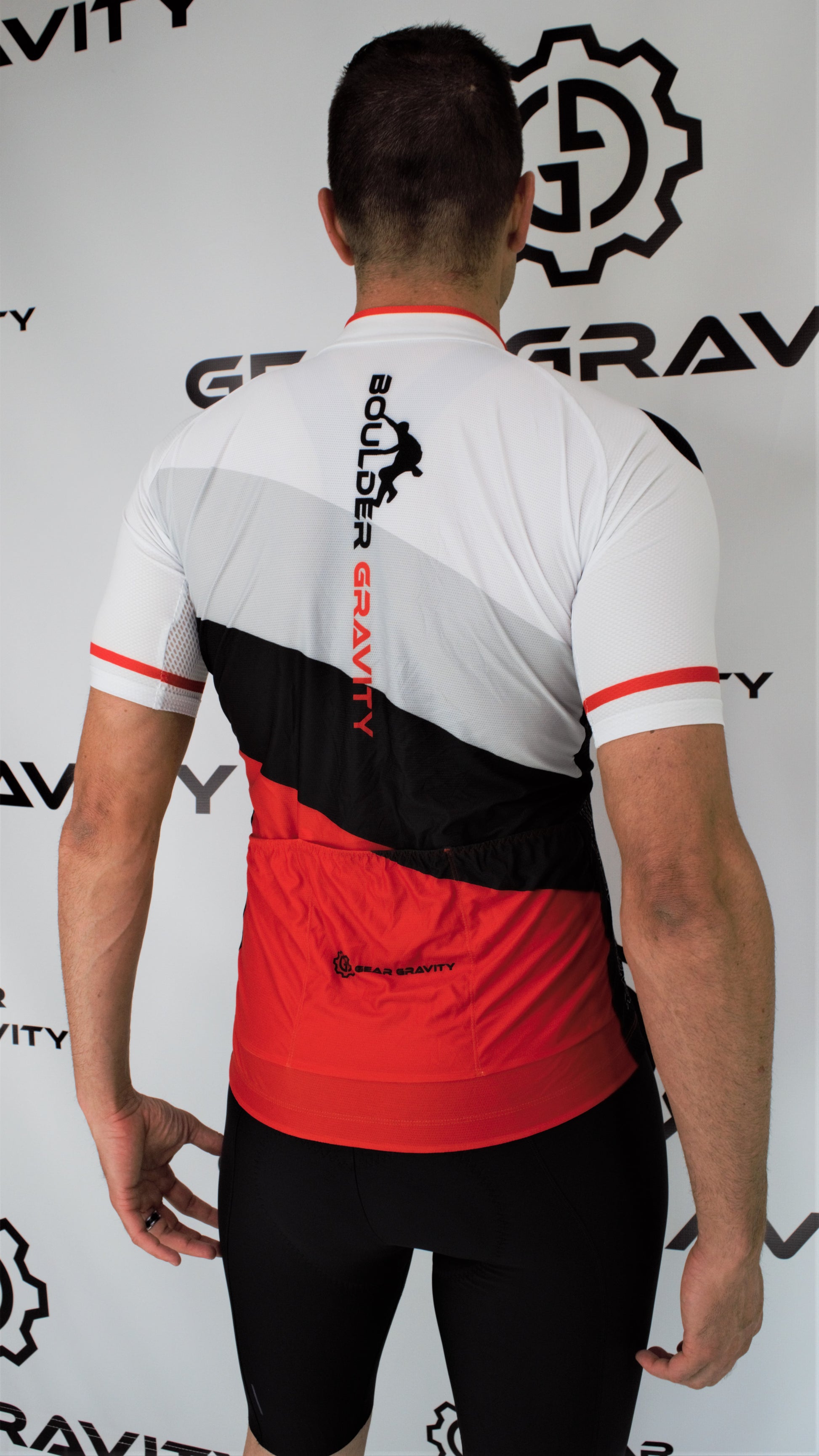 Here's a description for the product:

Experience the ultimate in performance and comfort with our top-fit, expertly crafted cycling jersey. Engineered with a blend of four lightweight, moisture-wicking fabrics, this jersey is designed to keep you cool, dry, and comfortable, no matter how long or intense your ride. The aerodynamic front panel and shoulders feature a slick, soft-touch fabric for a streamlined feel, while the high-air-pass back panel ensures maximum ventilation